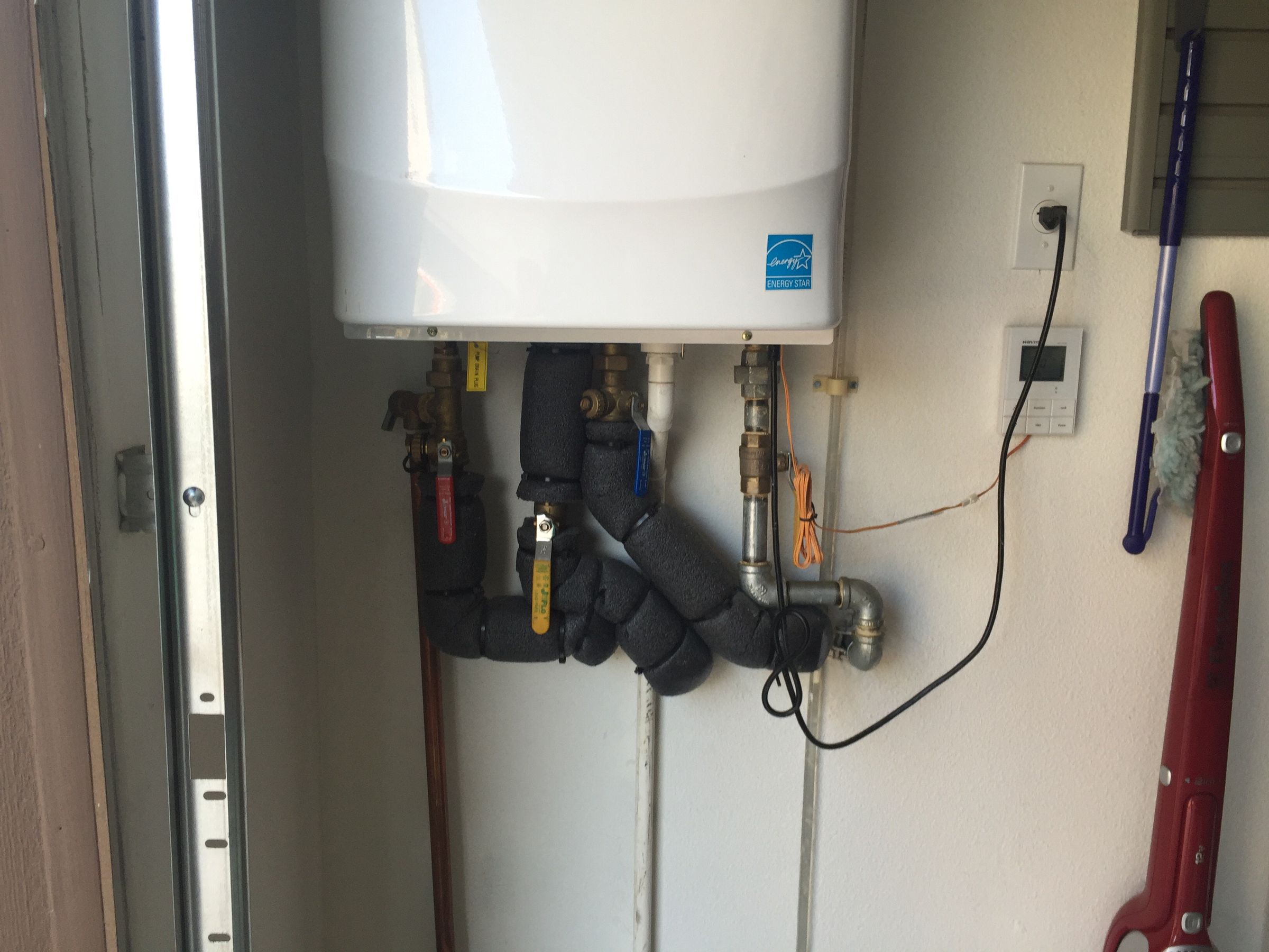 How to Flush a Tankless Water Heater and Clean the Air Intake Filter