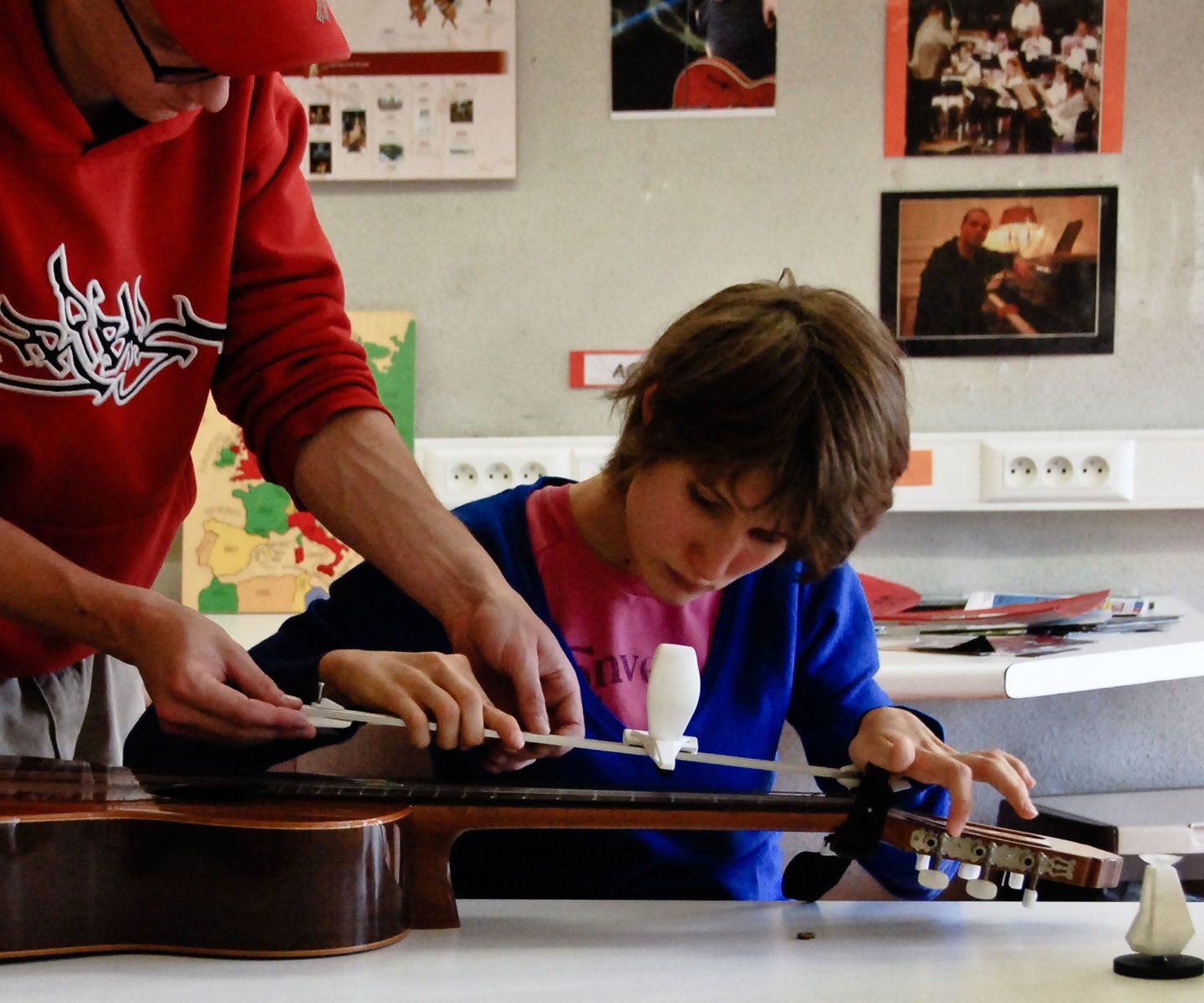 Guitar Aid for People With Limited Finger Agility.