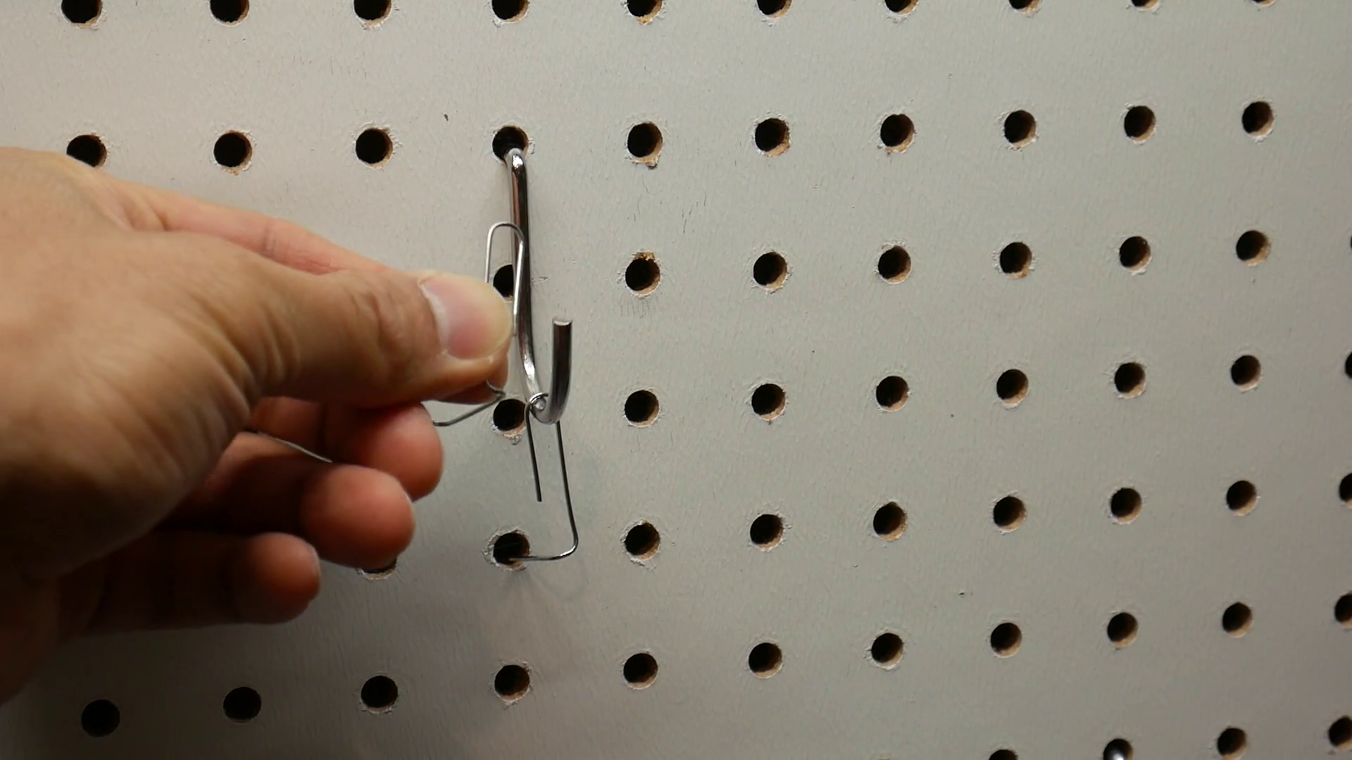 Keep Pegboard Hooks From Falling Out, How to Quickly Secure Any Pegboard Hook With a Paperclip