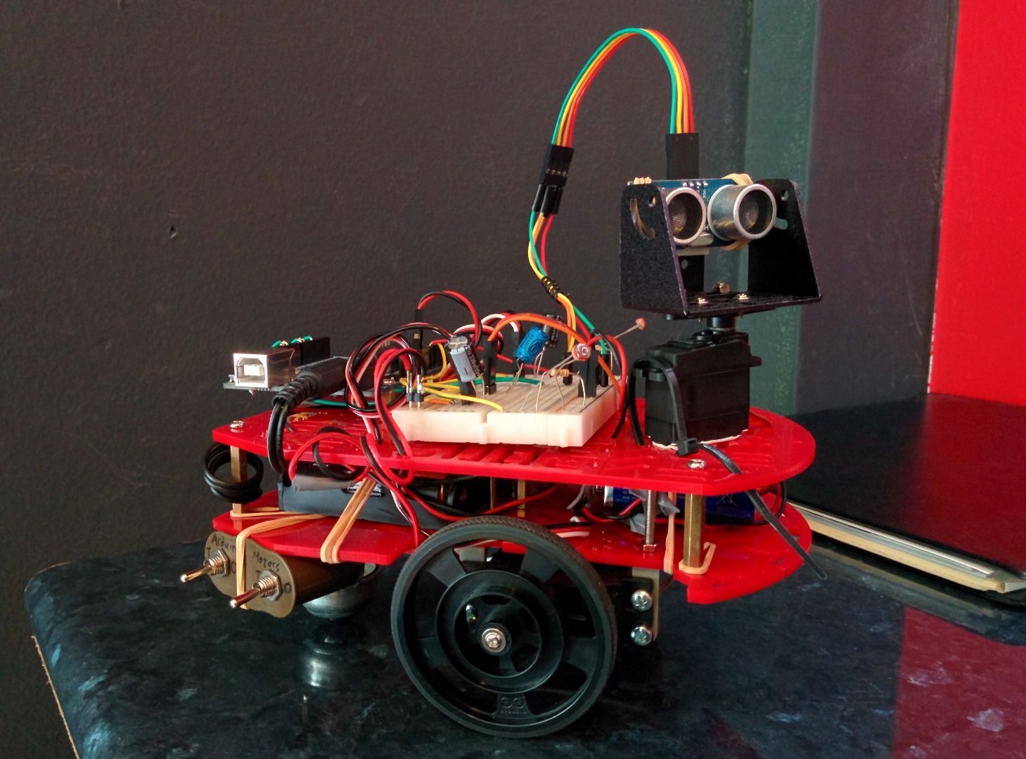 Light Seeking and Obstacle Avoiding Robot