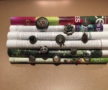 DIY Rings Display on a Rolled Up Magazine 