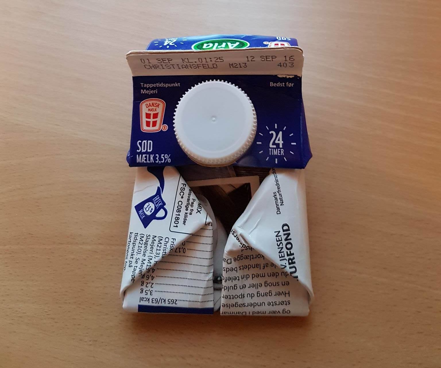 Folding a Cardboard Milk Container