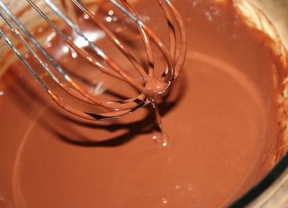 Pour the Hot Half and Half on the Chocolate and Stir
