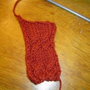 How to knit a cable