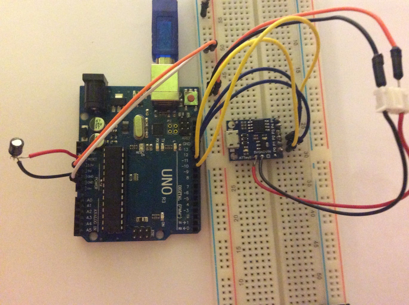 Connect the Arduino Uno to the ATtiny 85 Digispark.