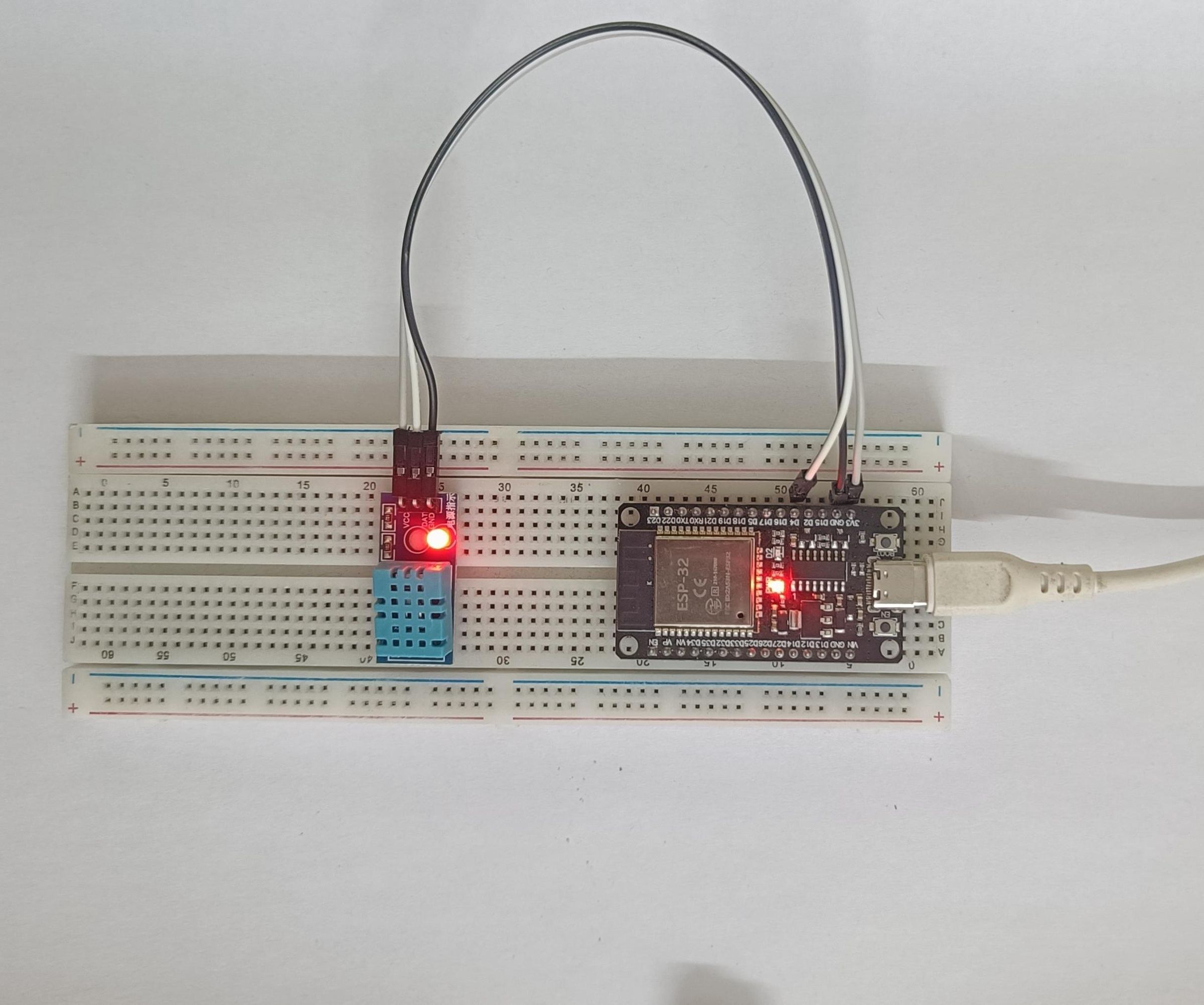 ESP32 + DHT11 Weather Monitor for V-VAC Dashboard