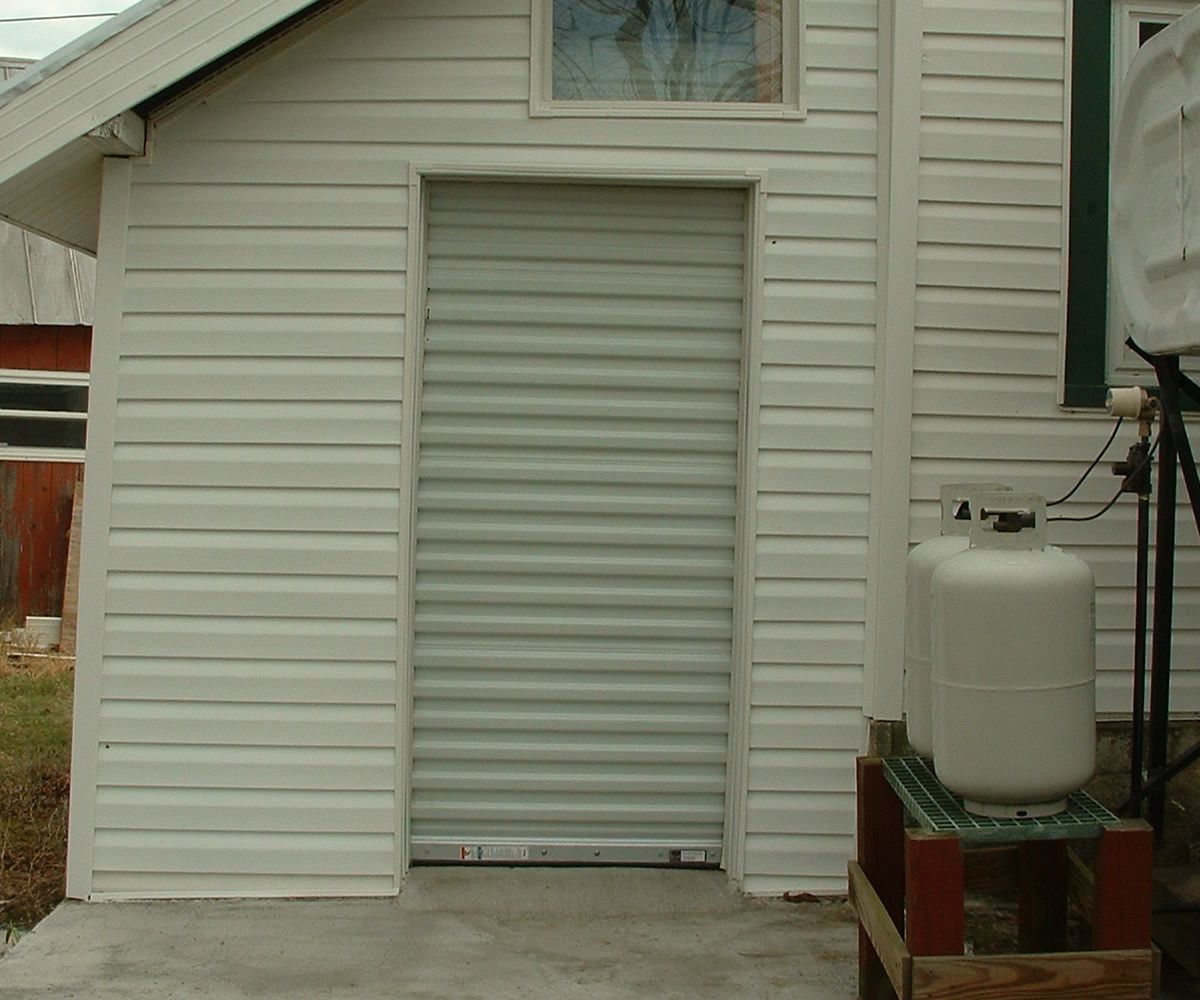 Installing a Roll Up "Can" Type Door