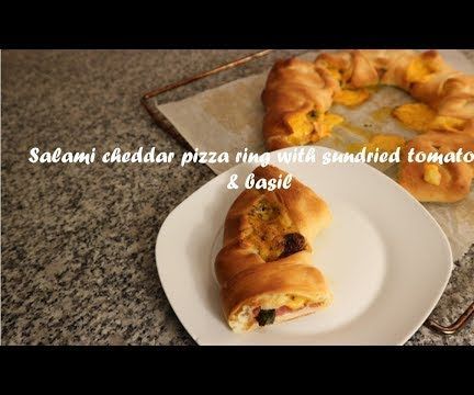 Salami Cheddar Pizza Ring With Sundried Tomatoes & Basil Recipe