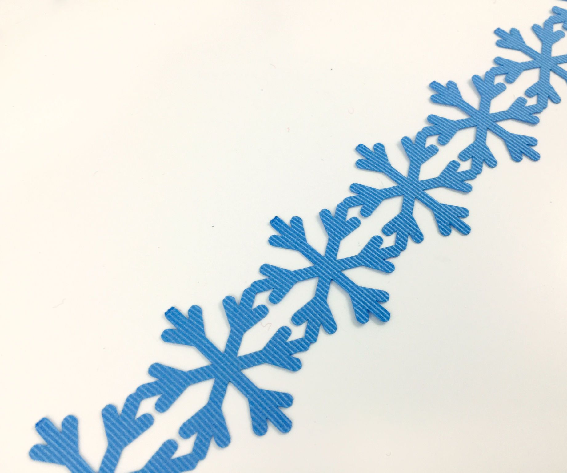 Laser Cut Holiday Ribbon & Garlands