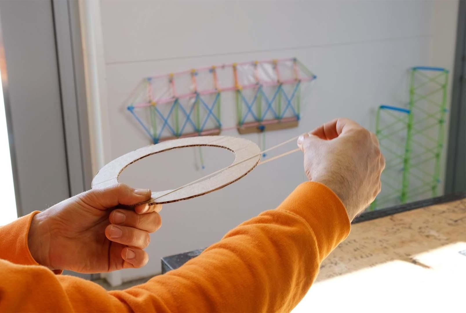 Release a Bouncing Cardboard Disc