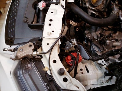 Disconnect Hydraulic Line Clips and Slave Cylinder