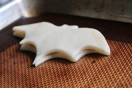 Fill the Bat Shaped Pumpkin Pie Pop Tarts and Seal