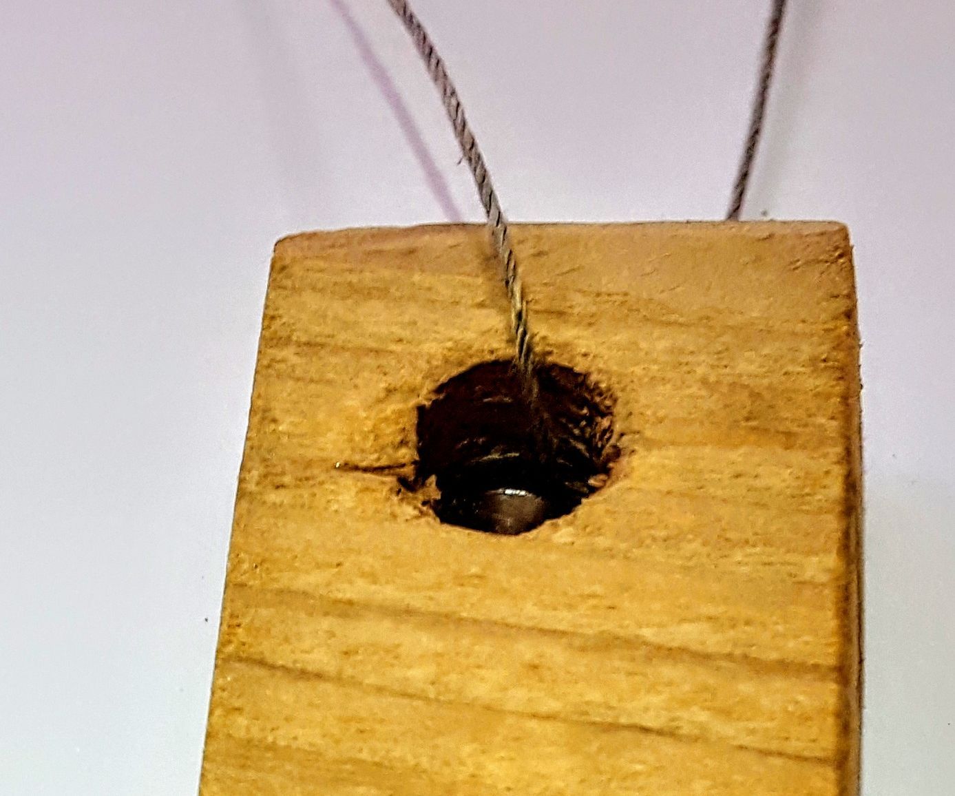 Nail Through Wood Pendant