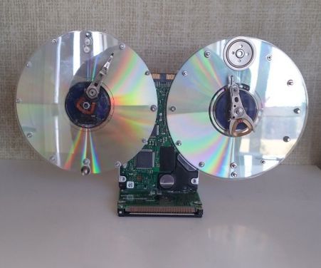 Dual-Faced Clock From Recycled Hard Drives