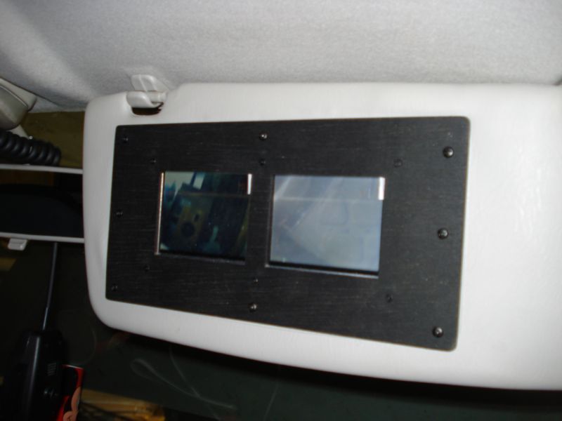 Vehicle Front-facing Cameras With Sunvisor Monitors