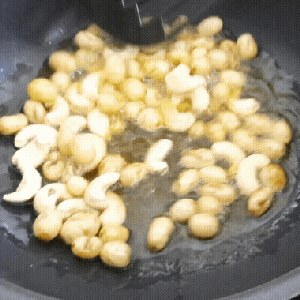 Fry Cashew Nuts and Raisins