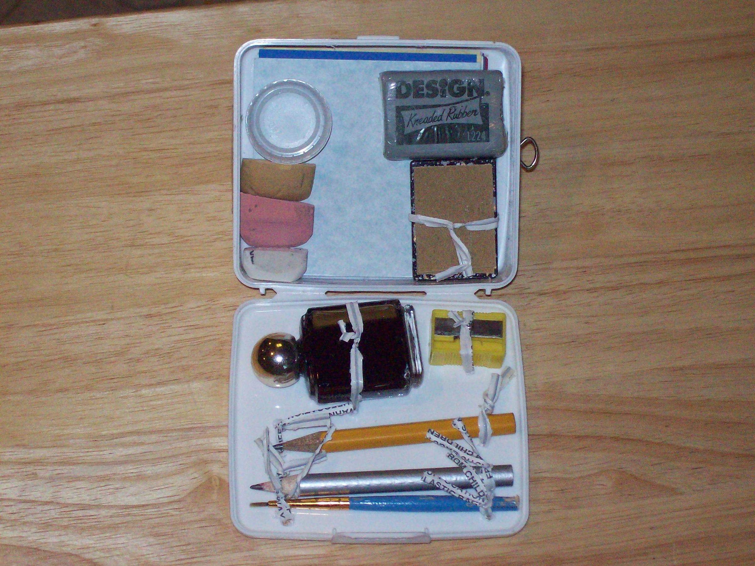 How to make a pocket sized mixed media art box from a plastic first aid kit