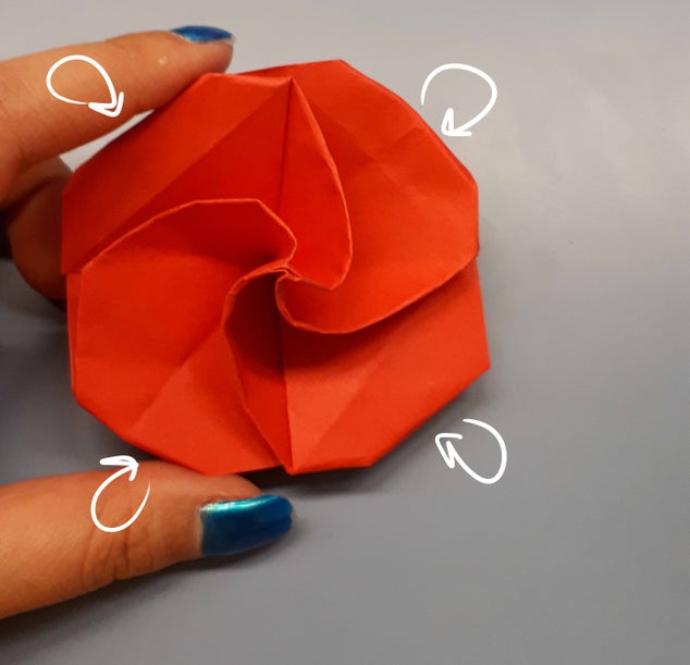 Step 12: Fold Down the Sides to Create Petals