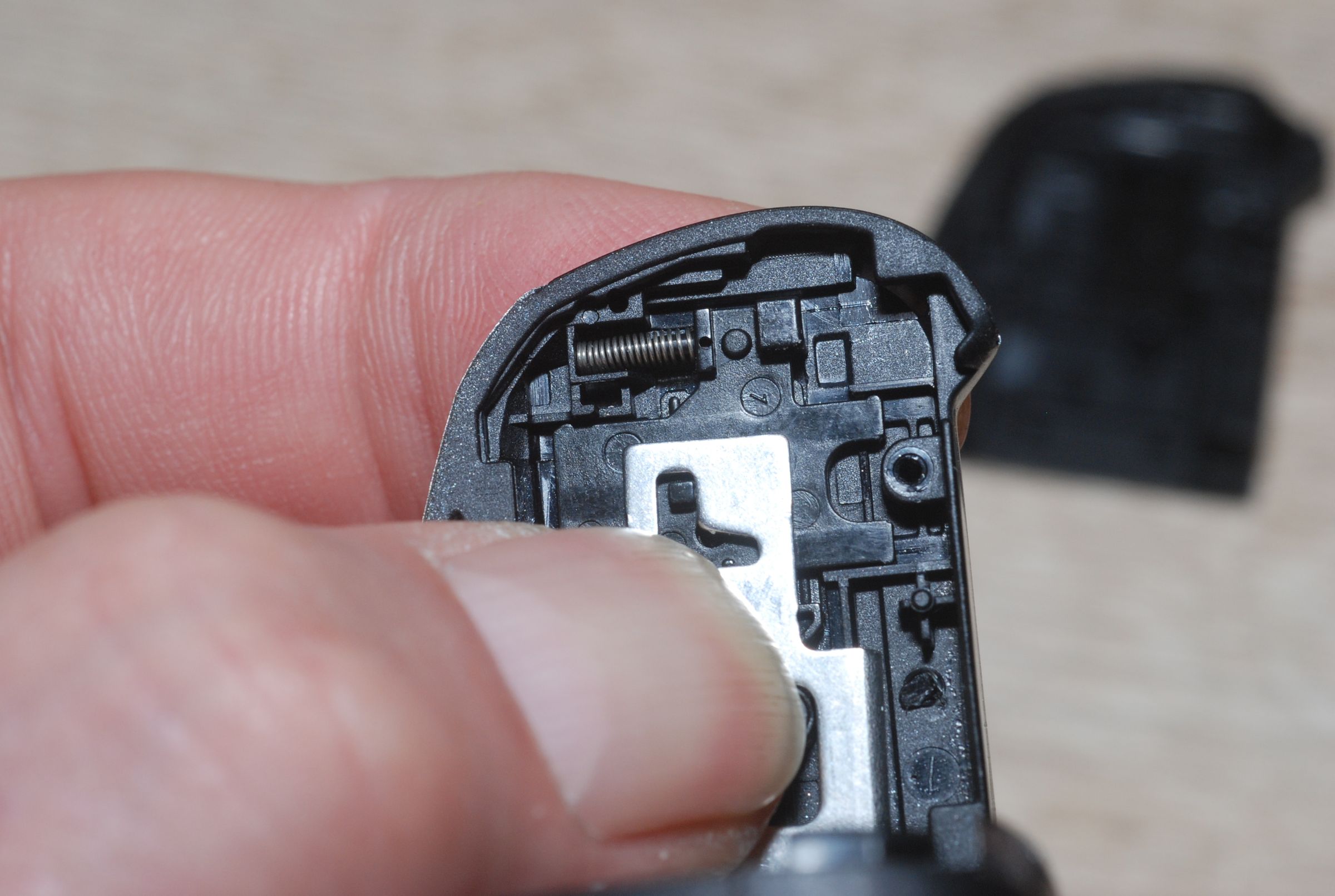 Replacement of Canon PowerShot SX130IS Battery Compartment Door 4