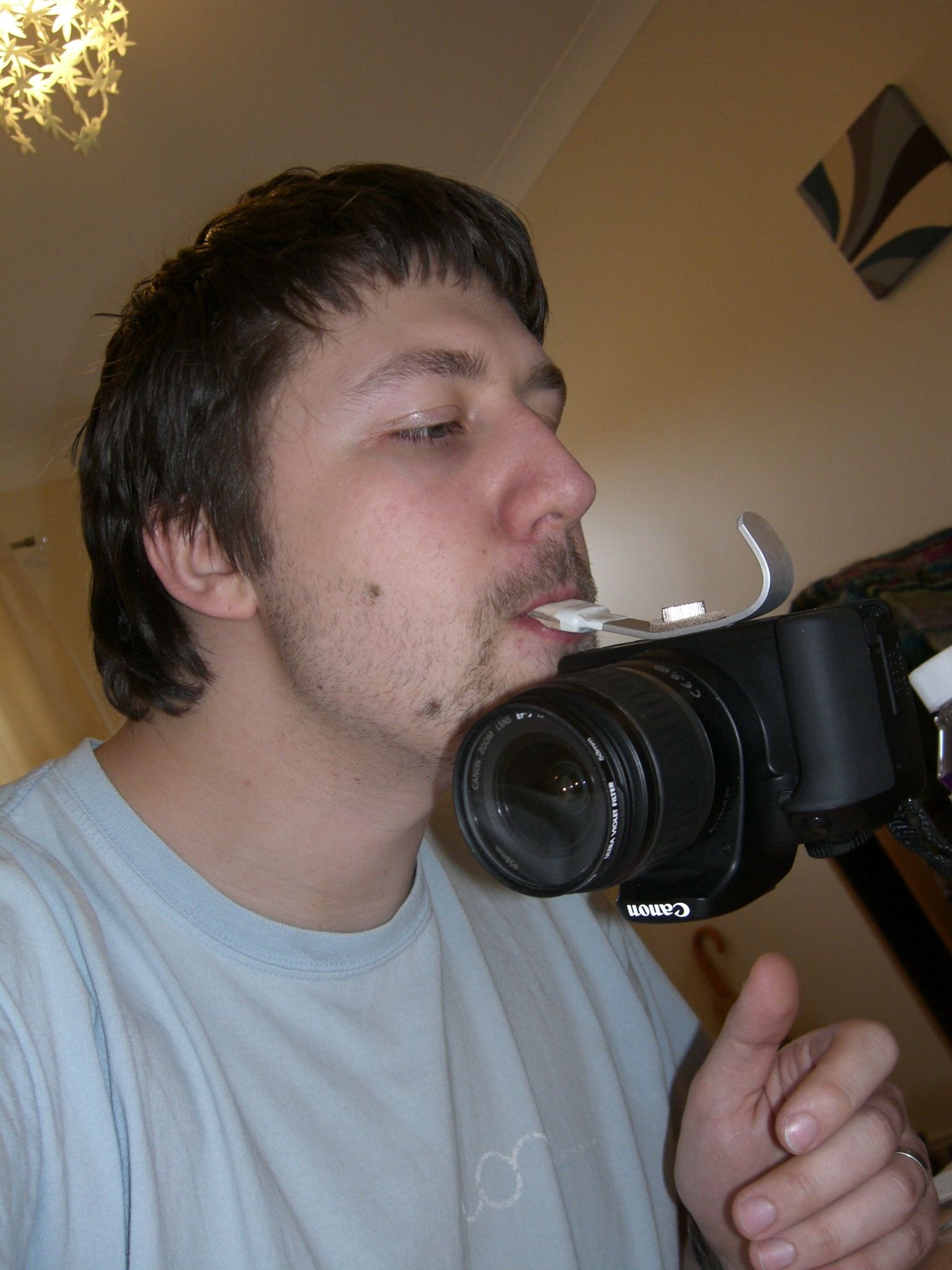 A Modification to Bertus52x11's Left Handed DSLR Holder. (with Added Mouth Grip)