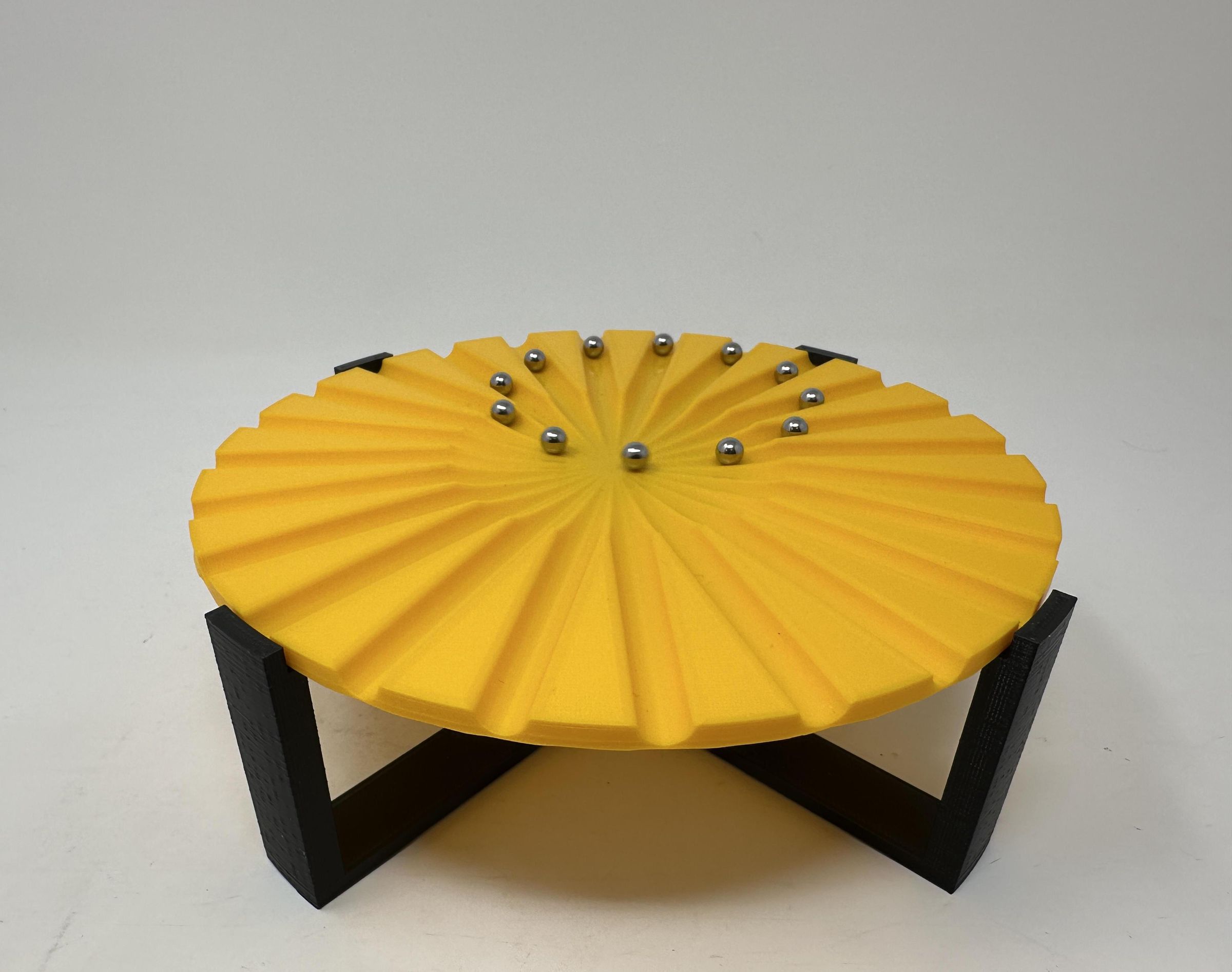 Marblevator, Marbles Go Round or Back and Forth?