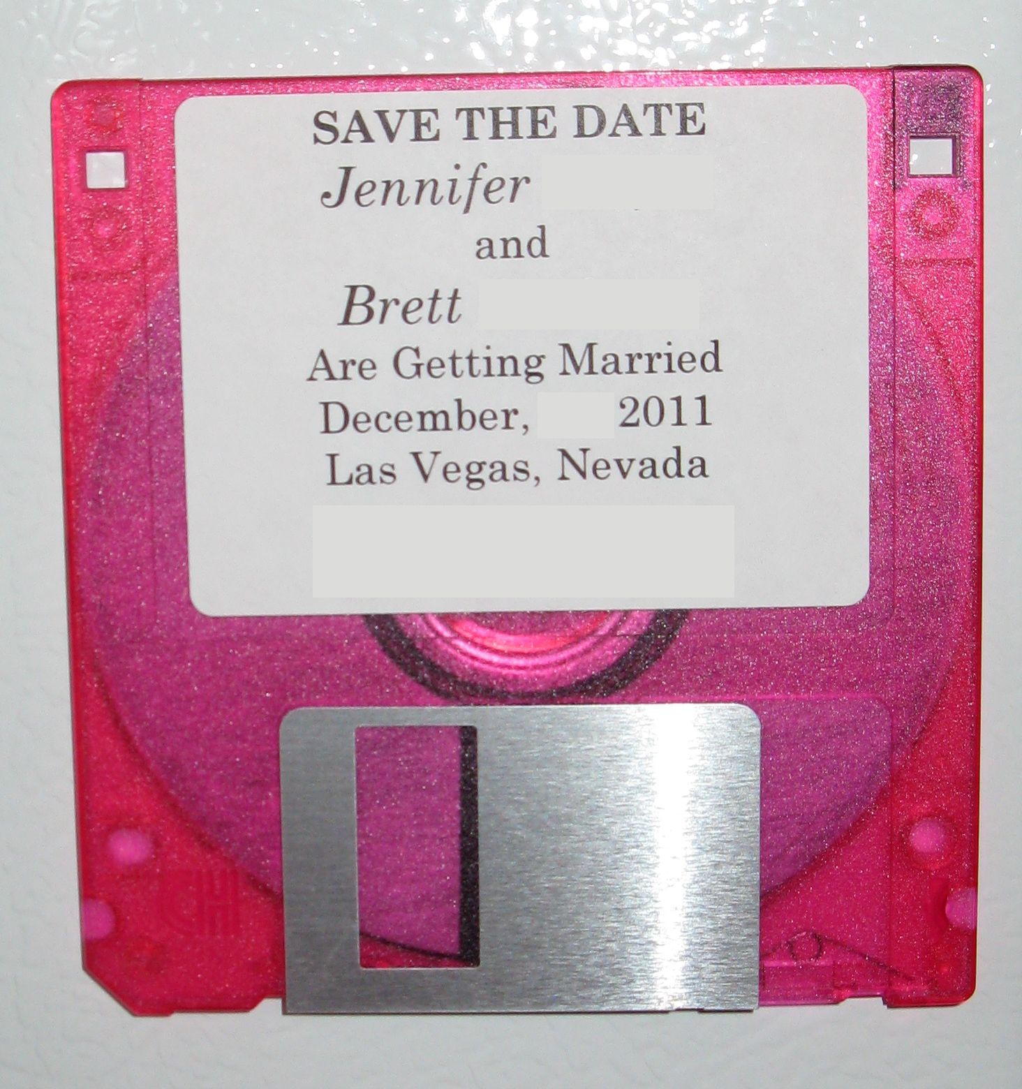 Wedding 'save the date' disk with hidden message
