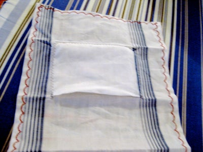 Fold Entire Hankie Into the Small Pocket