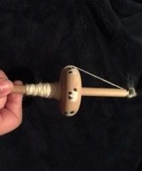 Learning How to Make Yarn With a DIY Drop Spindle!