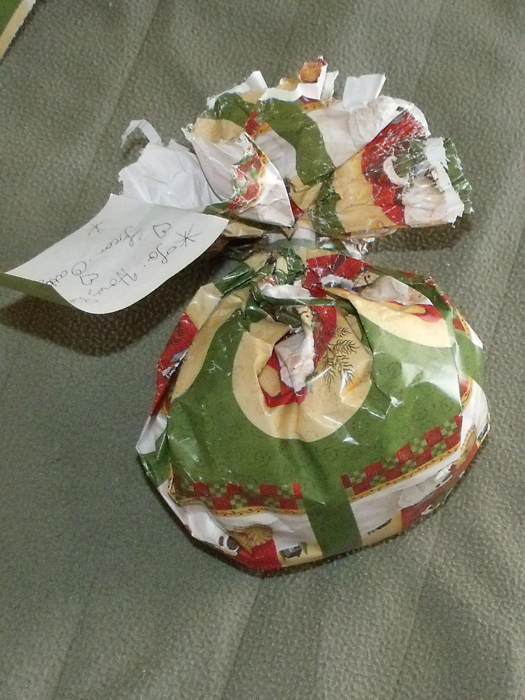 Wrapping Oddly Shaped Christmas Gifts With One Piece of Tape