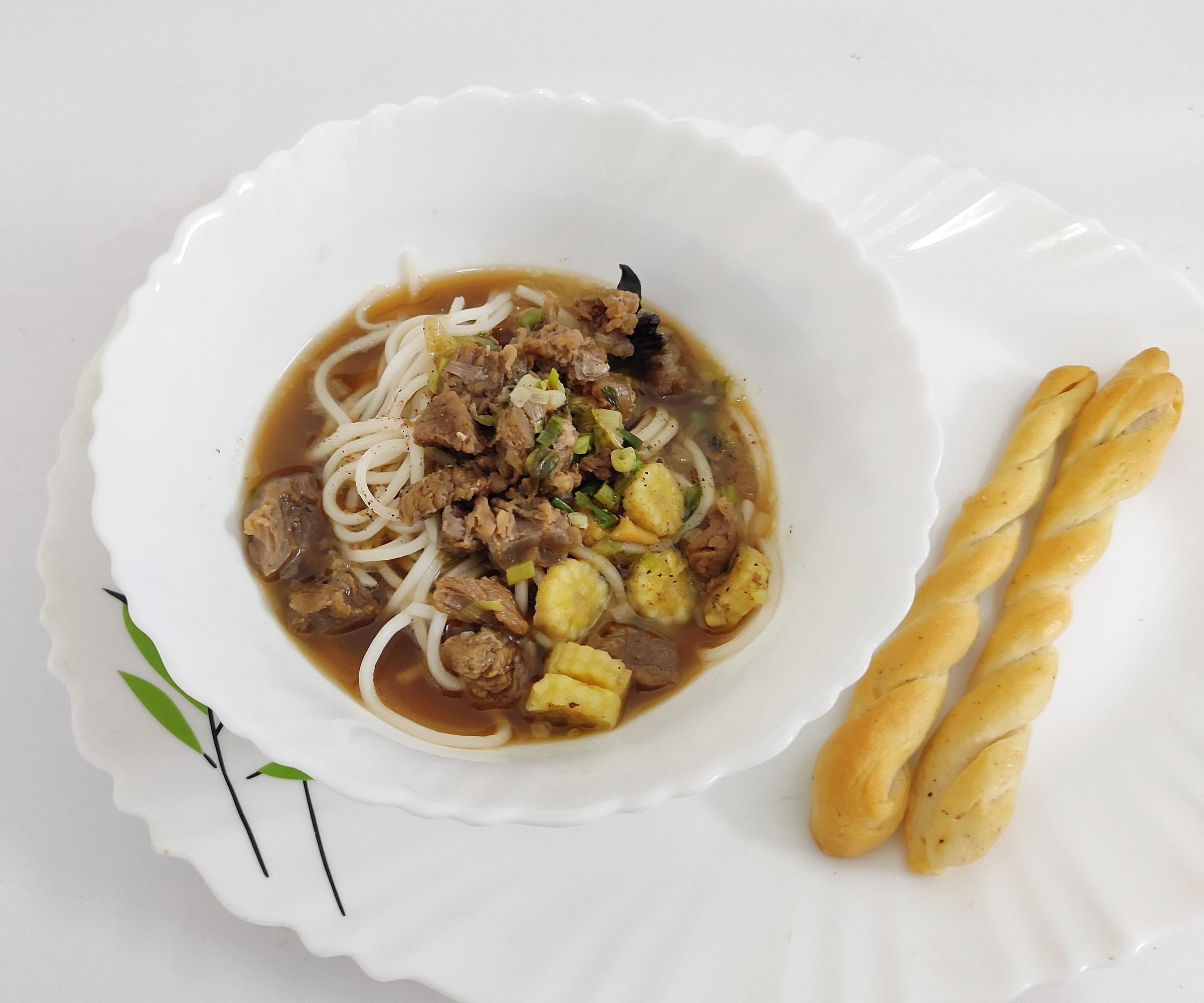 Beef Noodle Soup With Bread Sticks