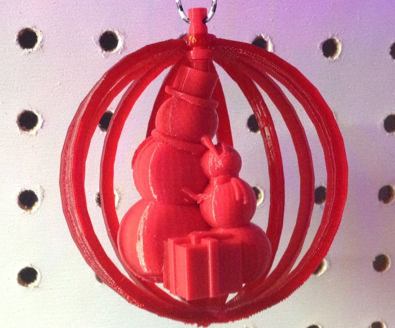 Hugging Snowmen in a Snow Globe