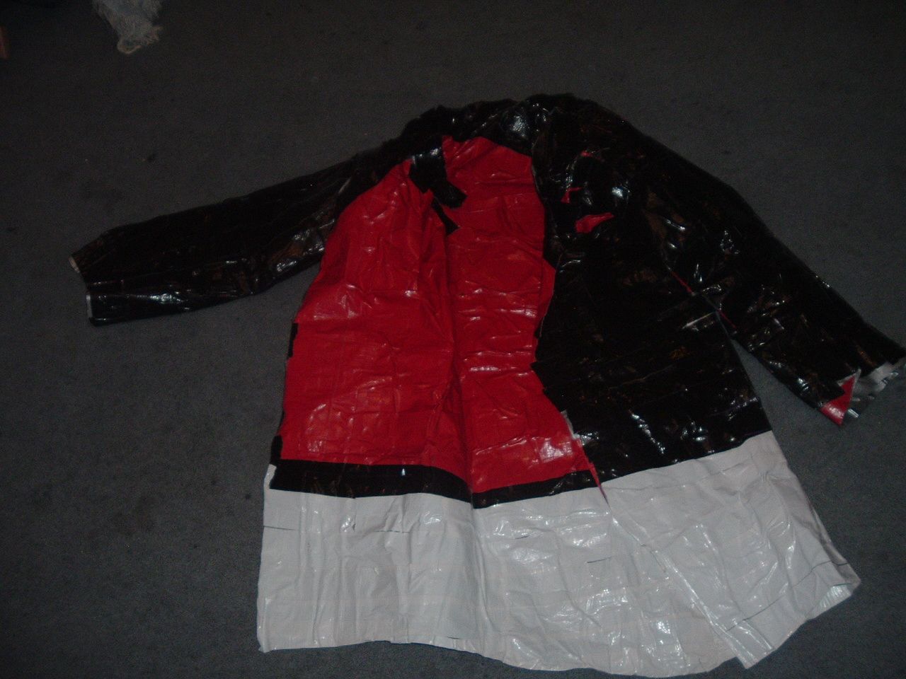 Duct-tape Rain Proof Jacket With Accesories.