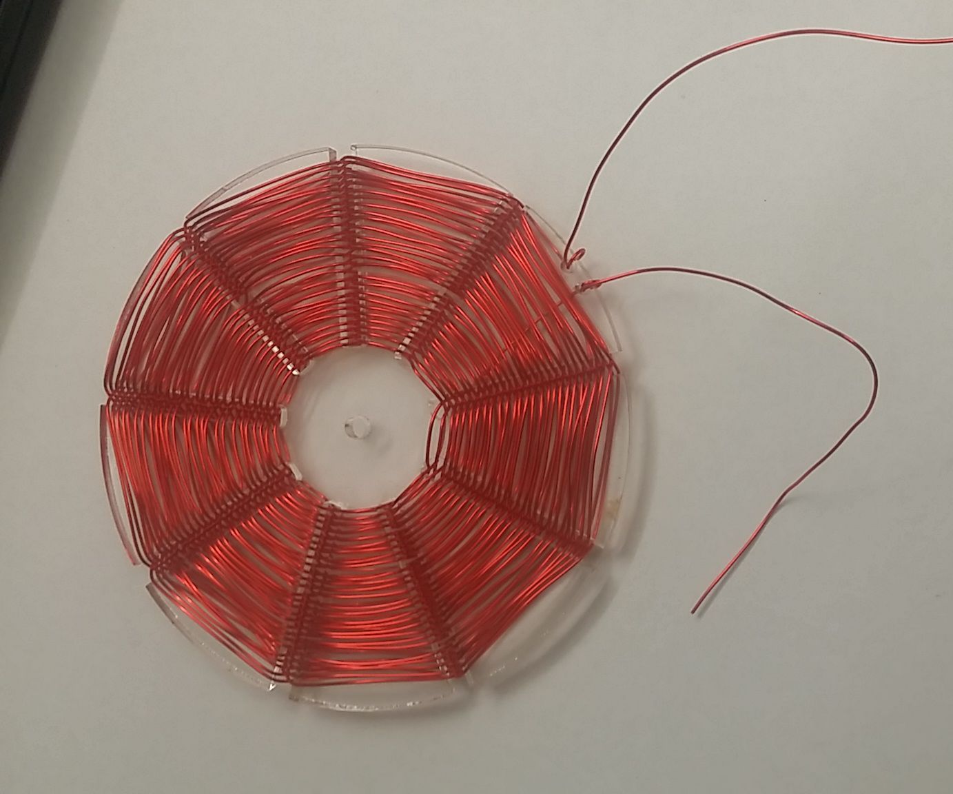 Spider web coil