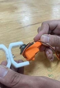 Connecting C-Clamp and Servo Mounted Leg