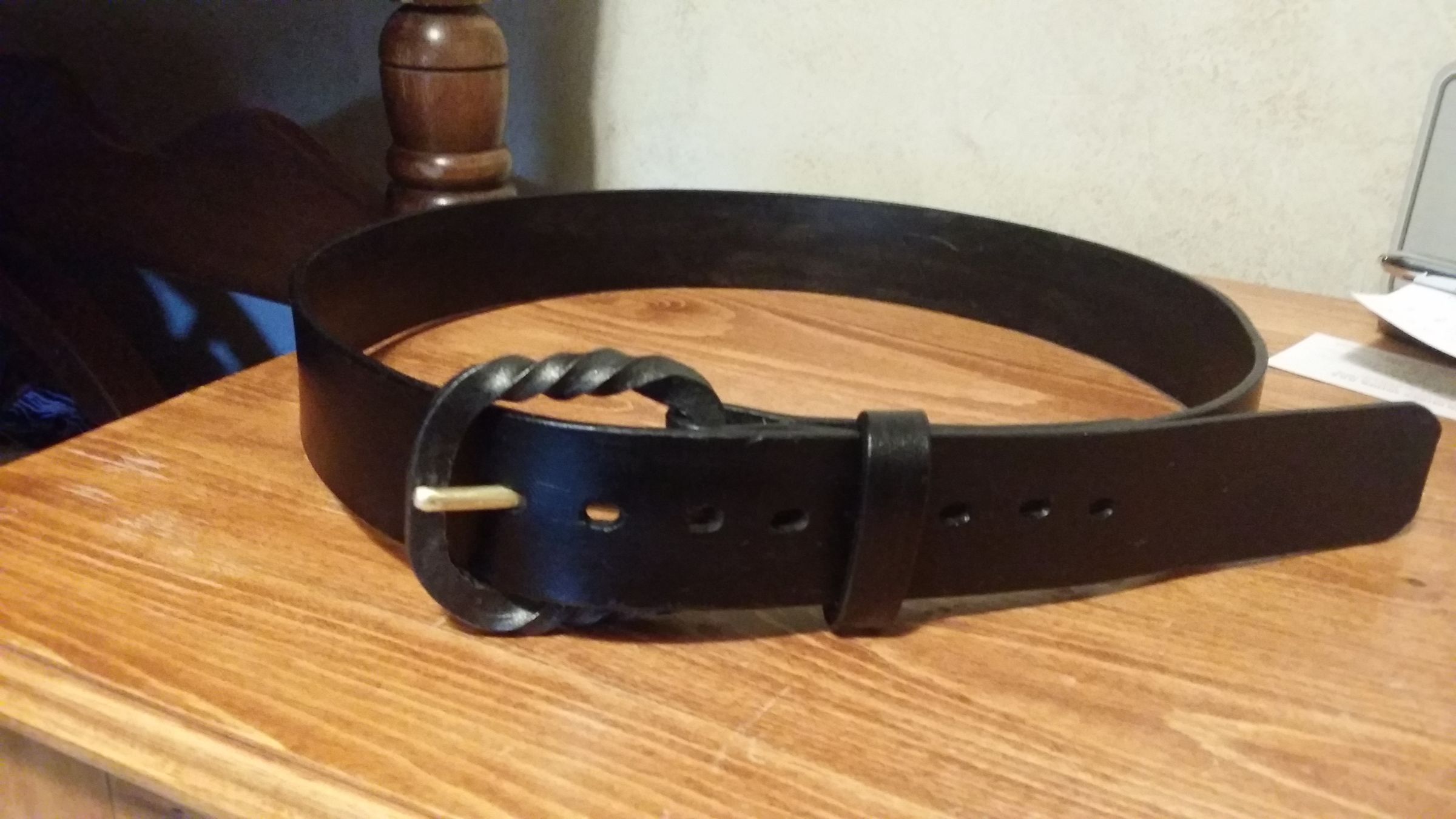 Leather Belt With a Forged Buckle.