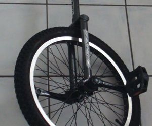 Attaching Dust Covers on Unicycle Cranks