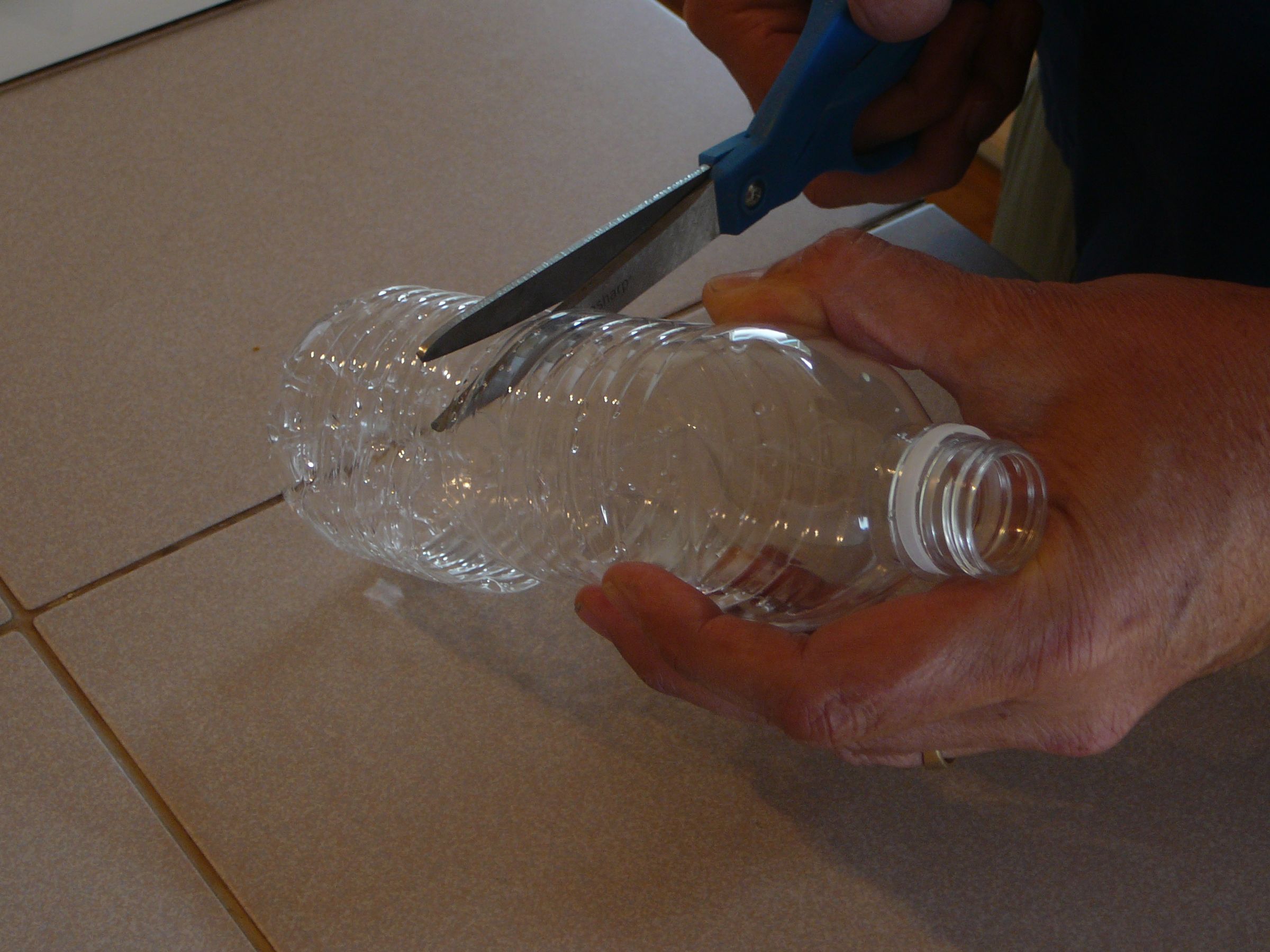 Self Watering Thermal Insulated Greenhouse for Seedlings/cuttings From Water Bottle.