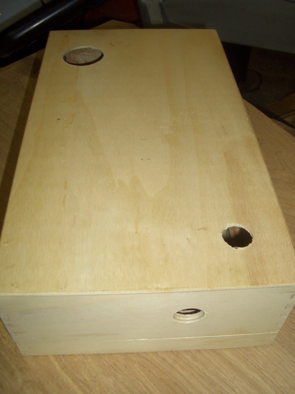 Drilling the Box for the Soundhole, Jack, and Volume Pot