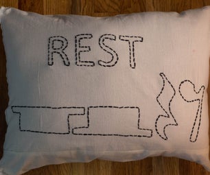 Embroidered "Rest" Pillow