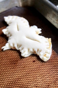 Fill the Bat Shaped Pumpkin Pie Pop Tarts and Seal