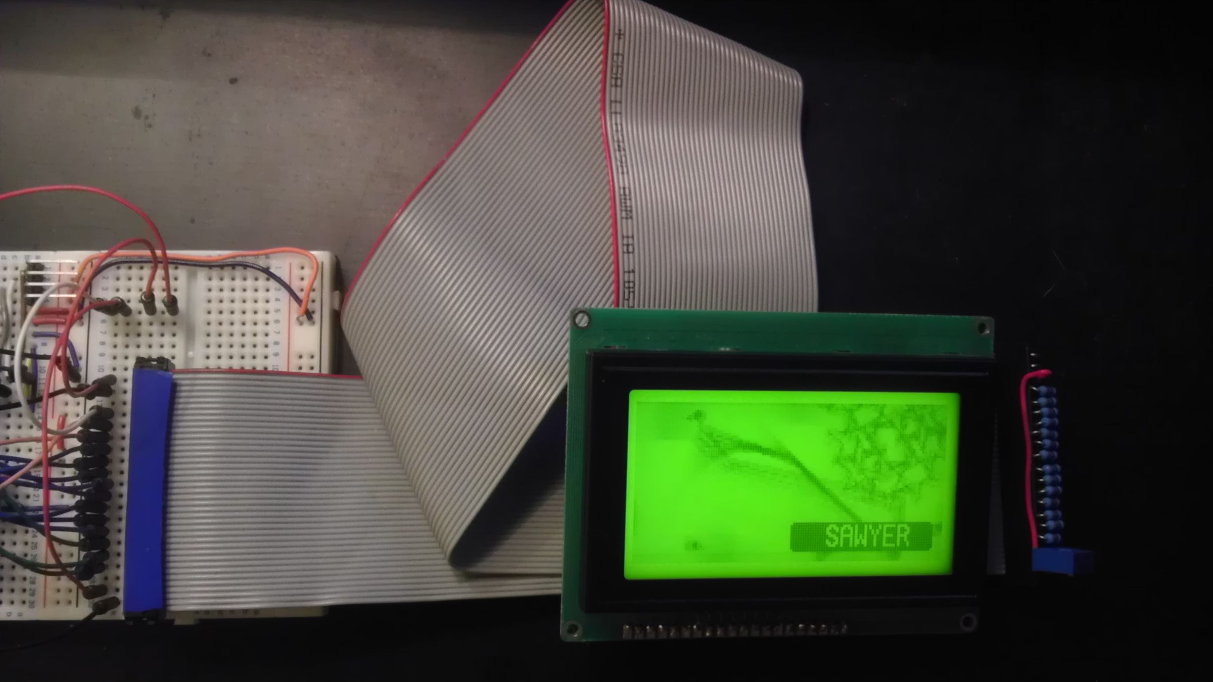 Hacked SCSI Hard Drive Cable for 128x64 screens using microcontrollers