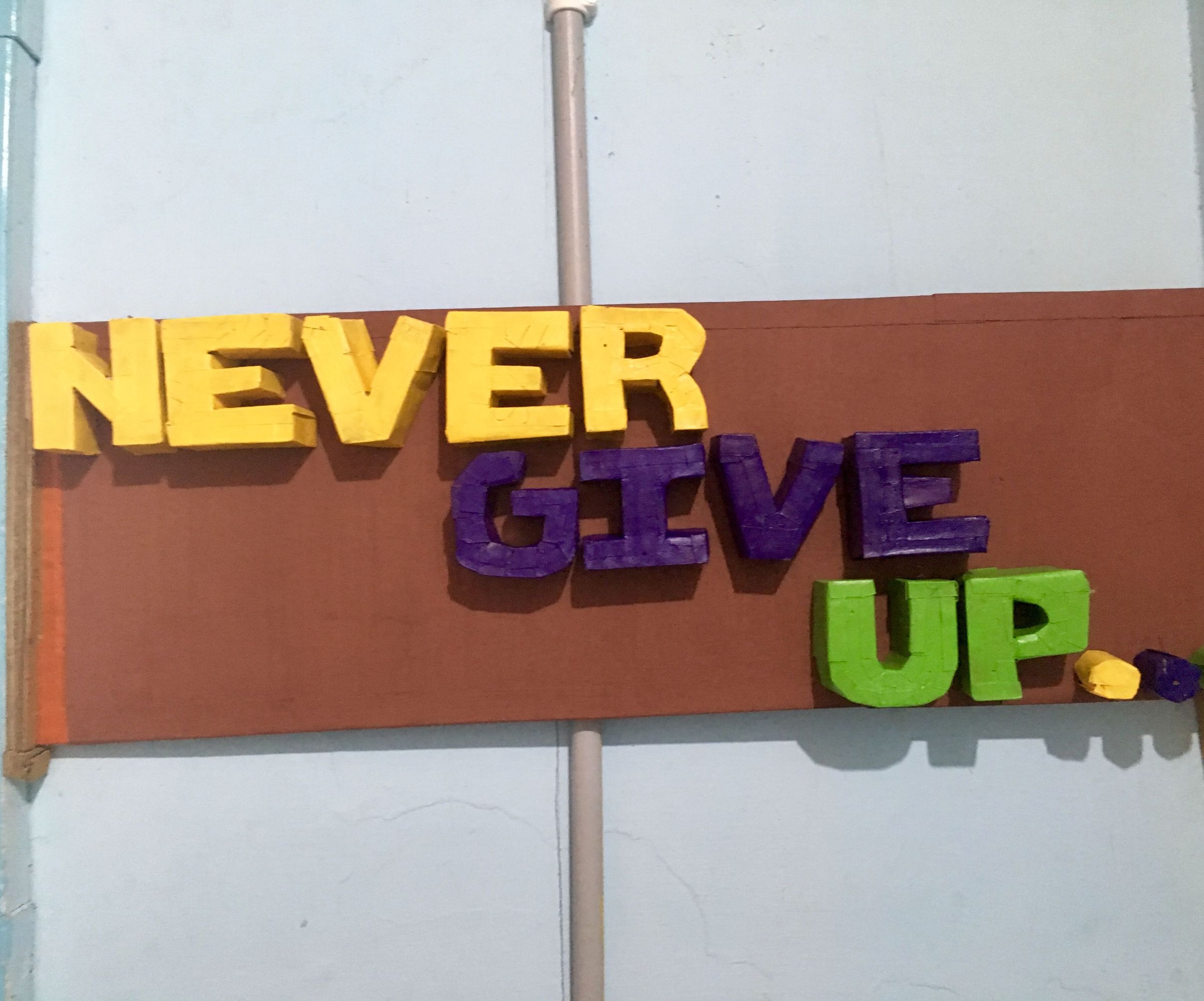NEVER GIVE UP