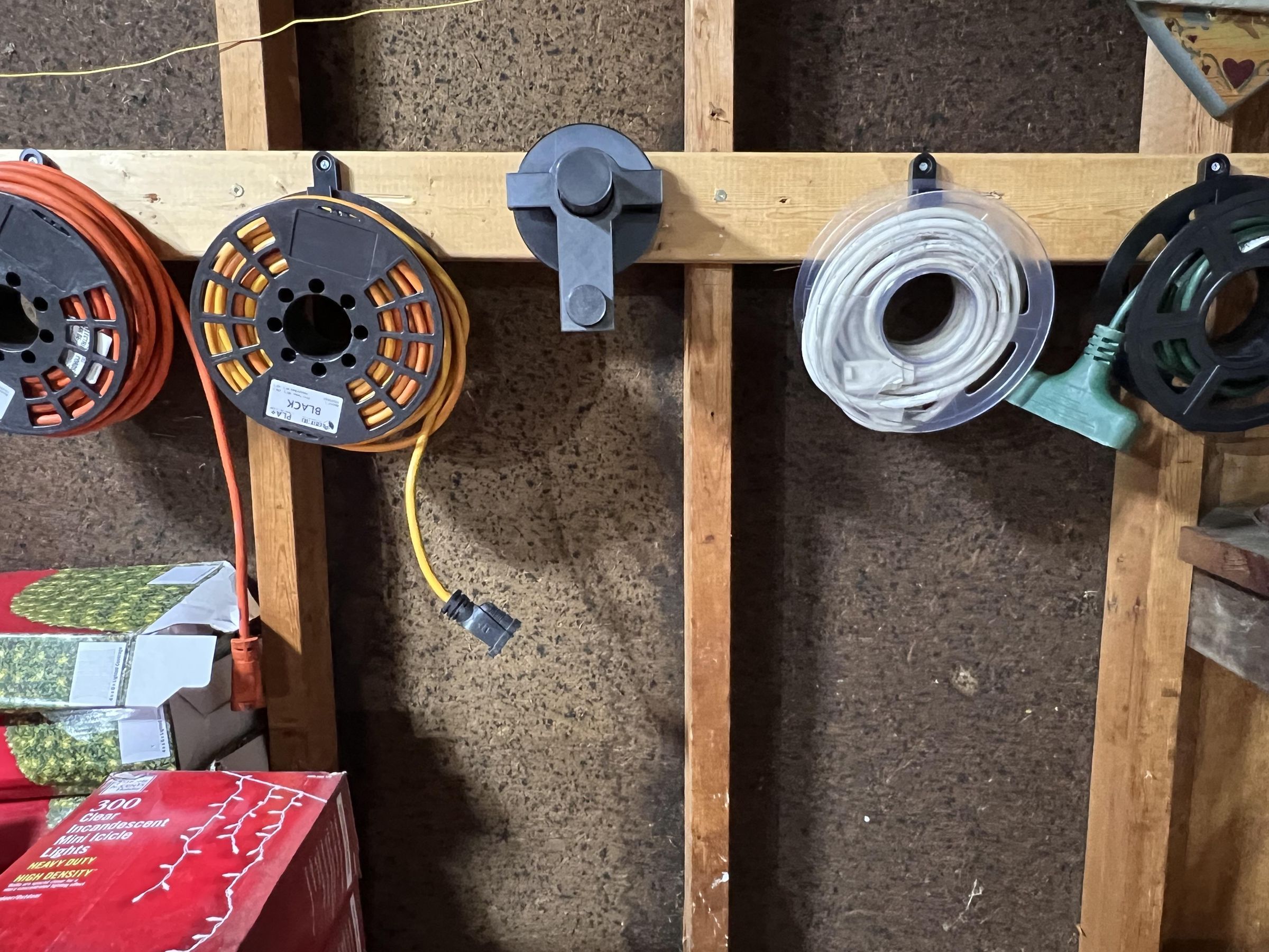 Extension Cord Rolling and Storage System Using Old Filament Spools 6