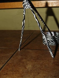 Under UV Light Duct Tape Tripod Compass