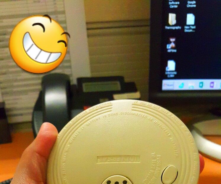 Inspection of an Expired Smoke Detector. 