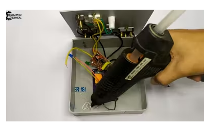 Stick the Circuit to Your Custom Designed Box With the Help of Glue Gun.