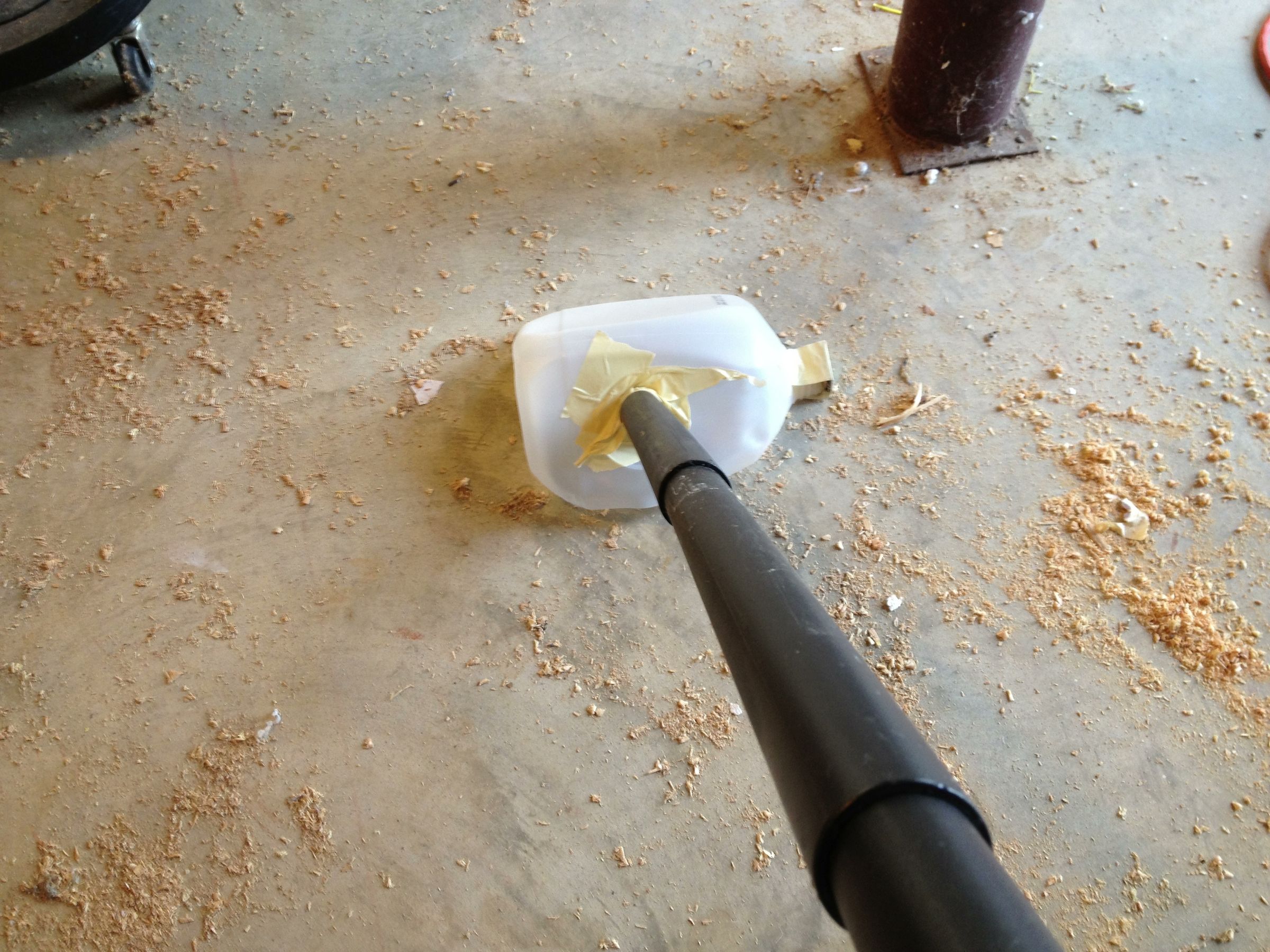 Improvised Shop-Vac Floor Nozzle Attachment From a Milk Jug