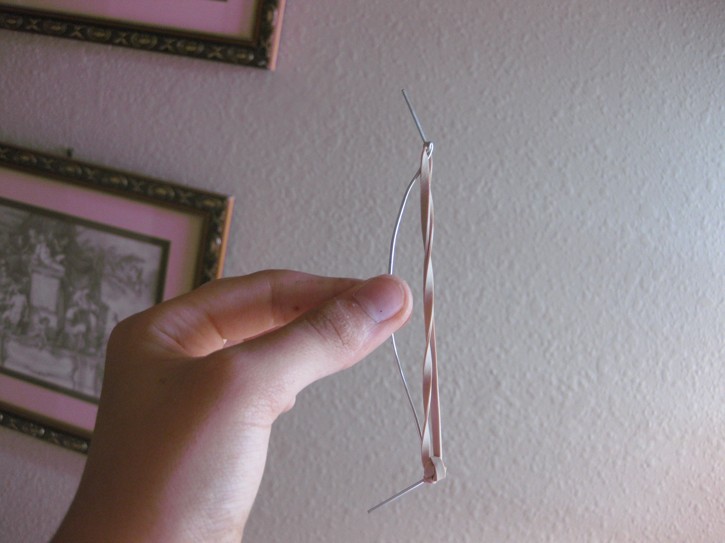 How to Make a Bow That Shoots Out of School Supplies