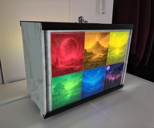 The Earth Genesis Rainbow: a Subtly Animated Double Sided 'Evolution of the Earth' Picture Light Box.