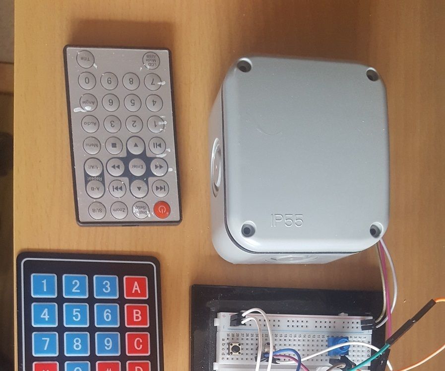 Arduino Infrared Alarm System With Remote Button 1 and 2 Simulating Home Automation
